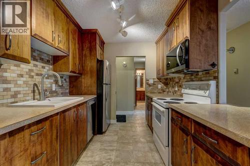 207, 111 14 Avenue Se, Calgary, AB - Indoor Photo Showing Kitchen