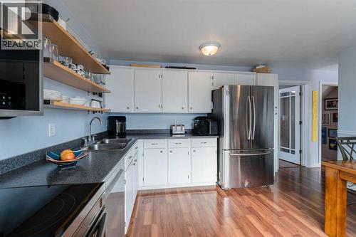 127 Shawmeadows Close Sw, Calgary, AB - Indoor Photo Showing Kitchen With Stainless Steel Kitchen With Double Sink