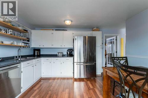 127 Shawmeadows Close Sw, Calgary, AB - Indoor Photo Showing Kitchen With Double Sink