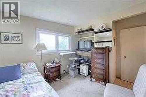 10212 8 Street Sw, Calgary, AB - Indoor Photo Showing Bedroom