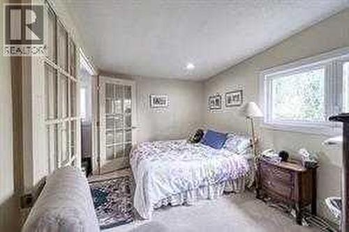 10212 8 Street Sw, Calgary, AB - Indoor Photo Showing Bedroom