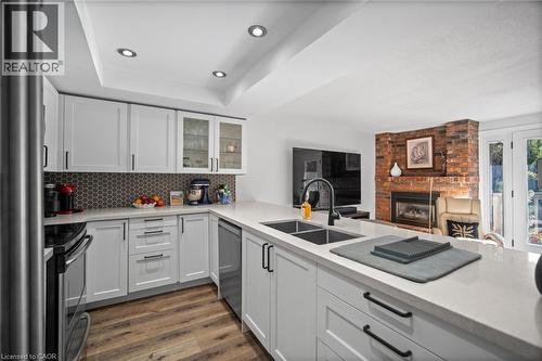 2058 Brant Street Unit# 3, Burlington, ON - Indoor Photo Showing Kitchen With Double Sink