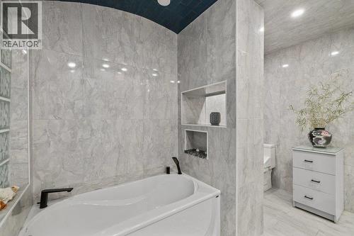 Private soaker tub in master. - 2245 Bennett Road, Kelowna, BC - Indoor Photo Showing Bathroom