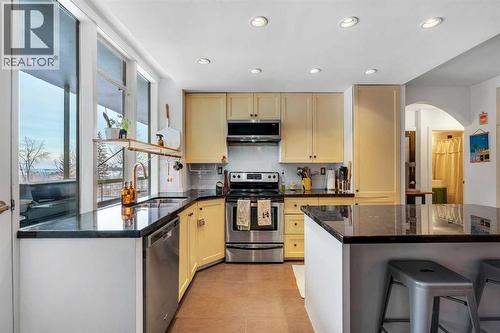 302, 3316 Rideau Place Sw, Calgary, AB - Indoor Photo Showing Kitchen With Stainless Steel Kitchen With Upgraded Kitchen