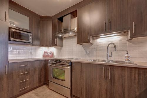 Kitchen - 402-651 Rue Jacques-Lavigne, Sainte-Thérèse, QC - Indoor Photo Showing Kitchen With Double Sink