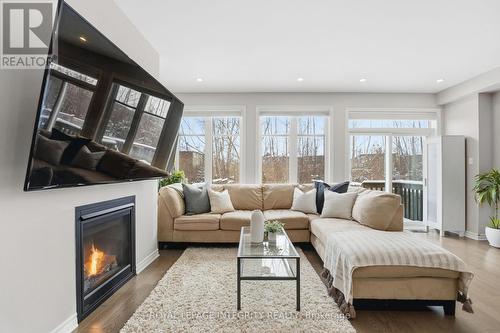 312 Wood Acres Grove, Ottawa, ON - Indoor Photo Showing Living Room With Fireplace