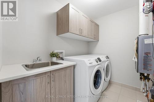 Upstairs laundry room - 312 Wood Acres Grove, Ottawa, ON - Indoor Photo Showing Laundry Room