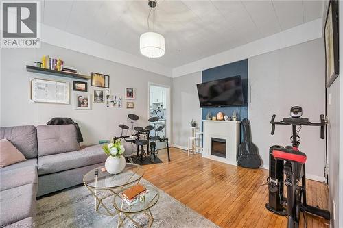 Unit 1 - 148 Suffolk Street W, Guelph, ON - Indoor Photo Showing Living Room With Fireplace