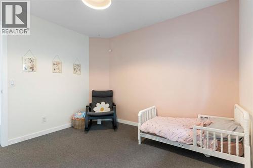 196 Jumping Pound Terrace, Cochrane, AB - Indoor Photo Showing Bedroom