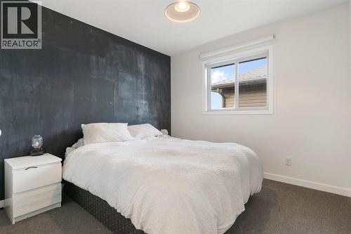 196 Jumping Pound Terrace, Cochrane, AB - Indoor Photo Showing Bedroom