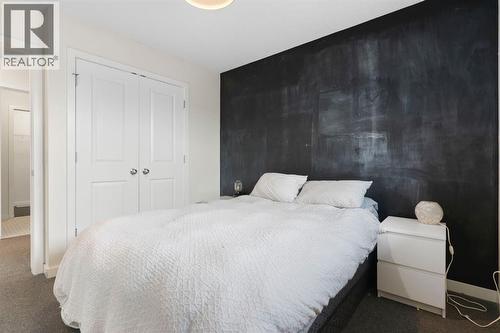 196 Jumping Pound Terrace, Cochrane, AB - Indoor Photo Showing Bedroom