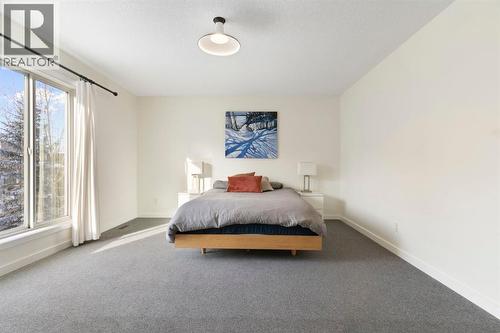 196 Jumping Pound Terrace, Cochrane, AB - Indoor Photo Showing Bedroom