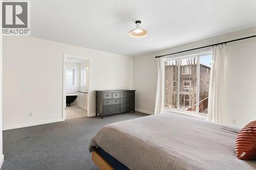 196 Jumping Pound Terrace, Cochrane, AB - Indoor Photo Showing Bedroom