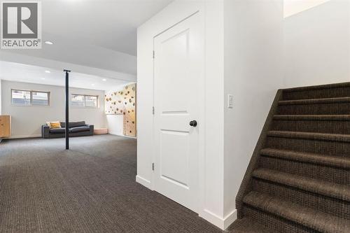 196 Jumping Pound Terrace, Cochrane, AB - Indoor Photo Showing Other Room