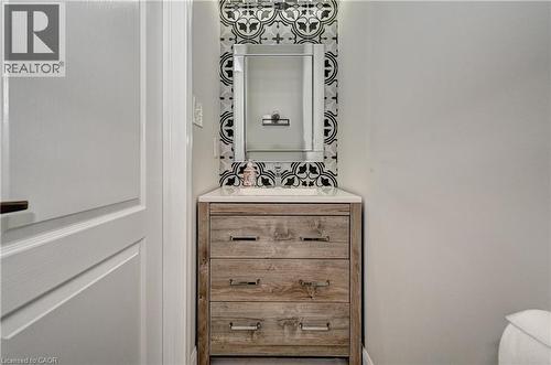 Bathroom featuring vanity and baseboards - 32 Weir Street, Cambridge, ON - Indoor Photo Showing Bathroom
