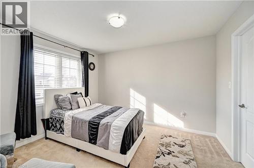 Bedroom featuring carpet floors and baseboards - 32 Weir Street, Cambridge, ON - Indoor Photo Showing Bedroom