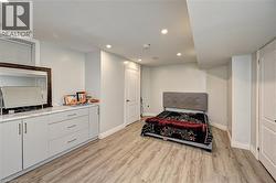 Bedroom featuring recessed lighting and light wood finished floors - 