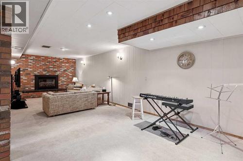 8603 Ashworth Road Se, Calgary, AB - Indoor With Fireplace