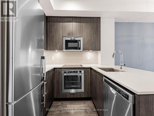 322 - 99 Eagle Rock Way, Vaughan, ON - Indoor Photo Showing Kitchen With Stainless Steel Kitchen With Upgraded Kitchen
