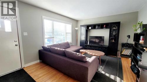 5418 37 Street, Red Deer, AB - Indoor Photo Showing Living Room With Fireplace