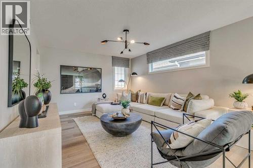55 Bridgeport Circle, Chestermere, AB - Indoor Photo Showing Living Room