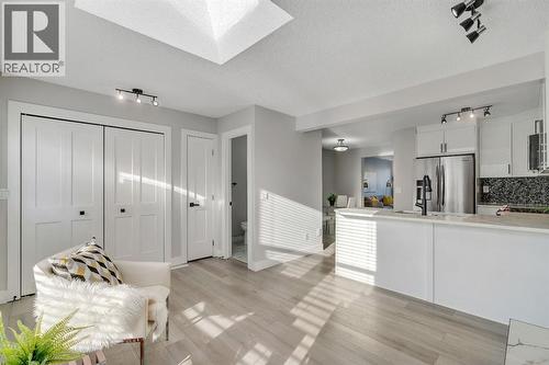 17 Mckernan Road Se, Calgary, AB - Indoor Photo Showing Kitchen