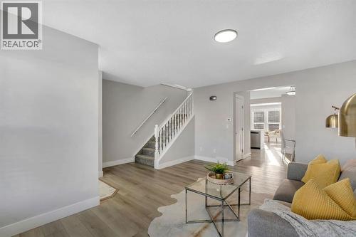 17 Mckernan Road Se, Calgary, AB - Indoor Photo Showing Living Room