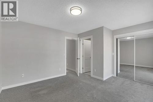 17 Mckernan Road Se, Calgary, AB - Indoor Photo Showing Other Room