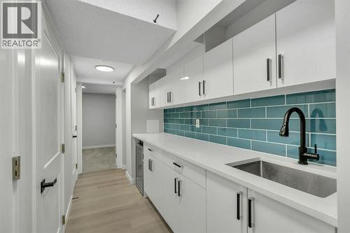 basement wet bar - 17 Mckernan Road Se, Calgary, AB - Indoor Photo Showing Kitchen