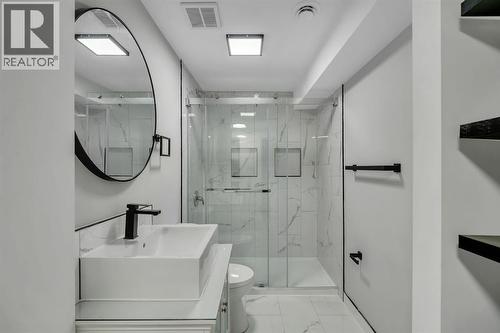 Basement bath - 17 Mckernan Road Se, Calgary, AB - Indoor Photo Showing Bathroom
