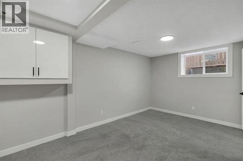 17 Mckernan Road Se, Calgary, AB - Indoor Photo Showing Other Room