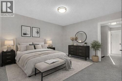 Virtually Staged Primary Bdrm - 17 Mckernan Road Se, Calgary, AB - Indoor Photo Showing Bedroom