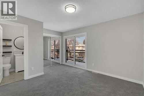 17 Mckernan Road Se, Calgary, AB - Indoor Photo Showing Other Room