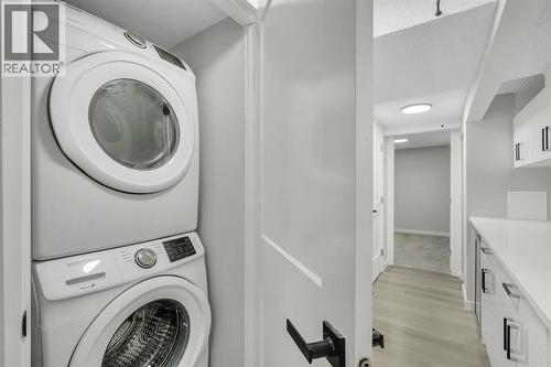 17 Mckernan Road Se, Calgary, AB - Indoor Photo Showing Laundry Room