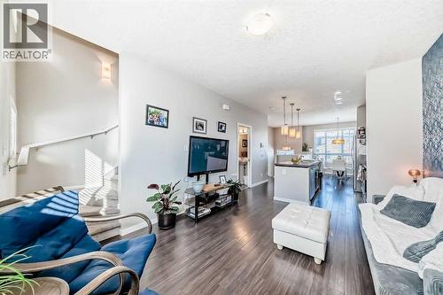 656 Copperpond Boulevard Se, Calgary, AB - Indoor Photo Showing Living Room