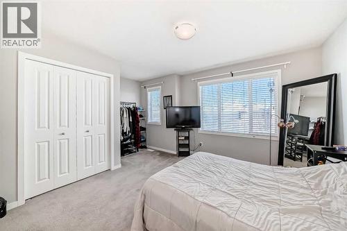 656 Copperpond Boulevard Se, Calgary, AB - Indoor Photo Showing Bedroom