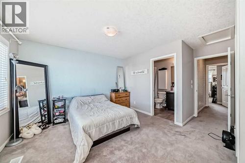 656 Copperpond Boulevard Se, Calgary, AB - Indoor Photo Showing Bedroom