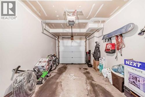 656 Copperpond Boulevard Se, Calgary, AB - Indoor Photo Showing Garage