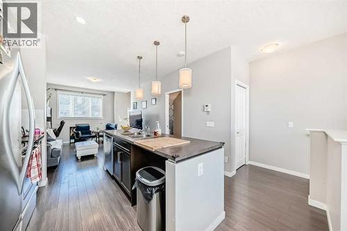 656 Copperpond Boulevard Se, Calgary, AB - Indoor Photo Showing Kitchen With Double Sink With Upgraded Kitchen