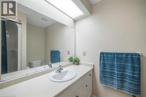 Bathroom with vanity and an enclosed shower - 25 Meadowvale Drive Unit# 3, Fonthill, ON - Indoor Photo Showing Bathroom