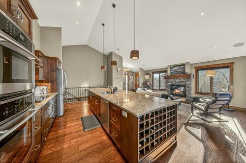 2596 Ledgerock Ridge, Invermere, BC - Indoor Photo Showing Kitchen With Fireplace With Upgraded Kitchen