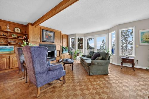 1050 Bartholomew Court, Kelowna, BC - Indoor Photo Showing Living Room With Fireplace