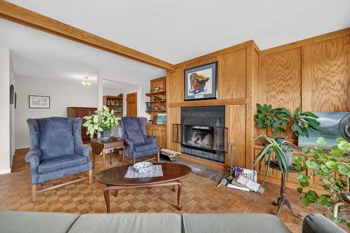 1050 Bartholomew Court, Kelowna, BC - Indoor Photo Showing Living Room With Fireplace