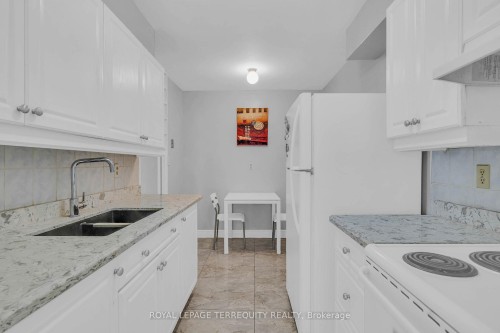1703-1 Massey Square, Toronto, ON - Indoor Photo Showing Kitchen With Double Sink
