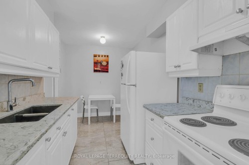 1703-1 Massey Square, Toronto, ON - Indoor Photo Showing Kitchen With Double Sink