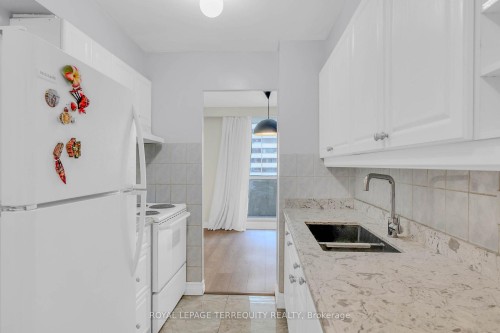 1703-1 Massey Square, Toronto, ON - Indoor Photo Showing Kitchen With Double Sink
