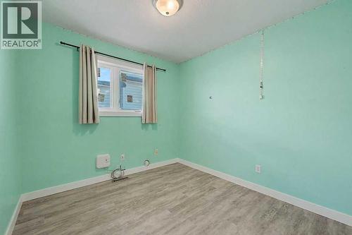 Bedroom 2 - 267 Panamount Hill Nw, Calgary, AB - Indoor Photo Showing Other Room