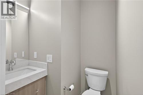 All 4 bathrooms upgraded counters/hardware/floor - 123 Maurice Drive Unit# 401, Oakville, ON - Indoor Photo Showing Bathroom