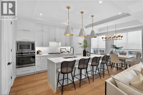 123 Maurice Drive Unit# 401, Oakville, ON - Indoor Photo Showing Kitchen With Upgraded Kitchen