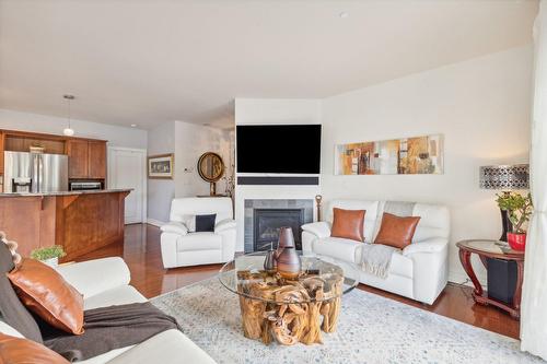 Living room - 201-100 Ch. Fraser, Gatineau (Aylmer), QC - Indoor Photo Showing Living Room With Fireplace